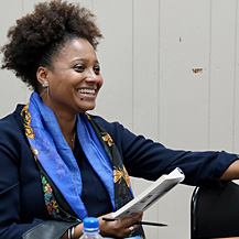 Tracy K. Smith reads and discusses poems from "American Journal: Fifty Poems for Our Time" with a small gathering at the United Houma Nation Vocational Rehabilitation Office in Houma, LA. December 14, 2018. Credit: Kevin Rabalais.